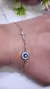 Pulsera plata ojito cruz - tienda online