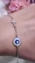 Pulsera plata ojito cruz - Joyas Maia