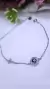 Pulsera plata ojito cruz - comprar online