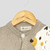 CARDIGAN OSO (gris/hueso) en internet