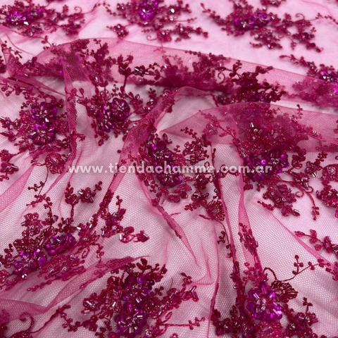 TUL BORDADO CON PIEDRAS FUCSIA
