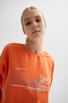 Buzo Crop Fit Naranja