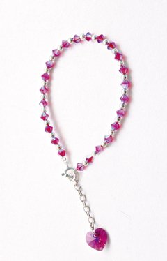 PULSERA SWAROVSKI CON BOLITAS - FUCSIA