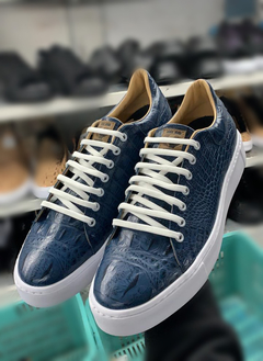 Pisa escamas azul