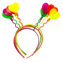 VINCHA PLASTICA FLUO CORAZON x4
