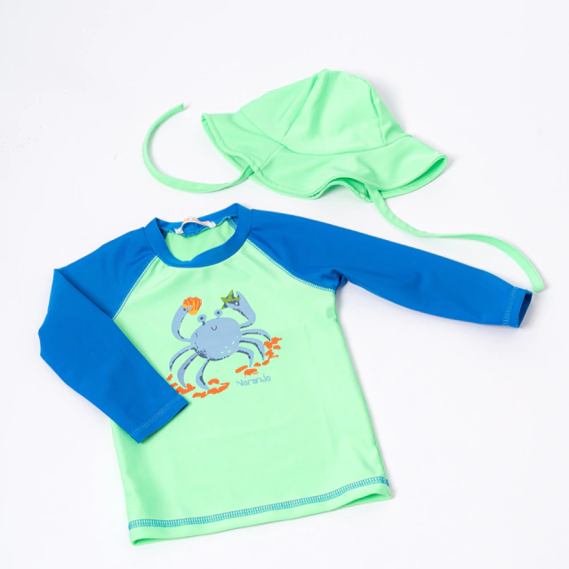 135920 Remera uv bebe lisa c/est m/largas comb