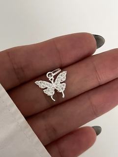 dije mariposa con piedras