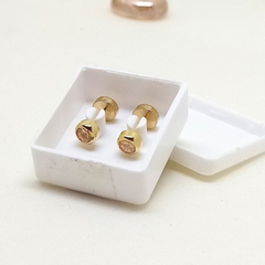 abridores tubo con piedra rosa