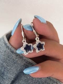 aros brisura con estrella azul (par)