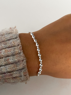 Pulsera ajustable bolitas y alas