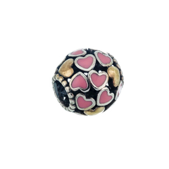 Charm dona con corazones rosas