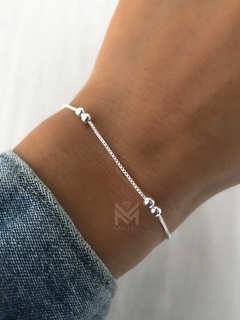 Pulsera doble bolitas