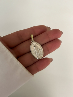 dije virgen milagrosa