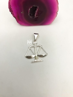 Dije balanza de la justicia