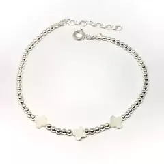 Pulsera bolitas con flor de nacar