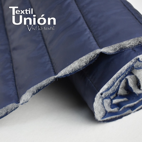MATELASSÉ DE SIRE BRILLOSO Y TAFETA-AZUL MARINO BASTONES 5 CM/GUATA 150 GRS