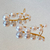 Brinco Earhook Pérolas Gaia na internet