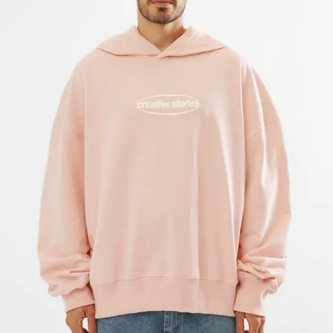 Buzo canguro over creative rosa