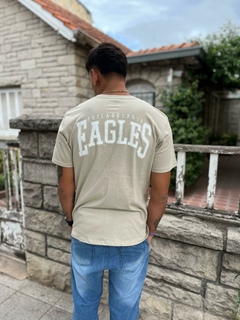 Remera cumplida Eagles beige - comprar online