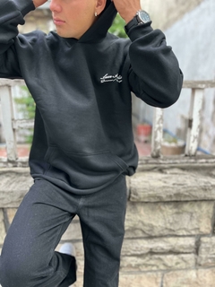 Canguro over frizado Luxe negro