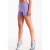 Short calza lila para mujer, ideal para actividades deportivas y casuales.