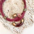 collar con dije de vidrio y cordon de cuero color bordeaux