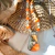 Collar de largo regulable color naranja