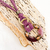 Collar artesanal color morado y bordo con detalles en bronce