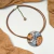 Collar Dafne Camel Gris 181 en internet