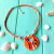 Collar de cuero color naranja con pendiente hecho a mano