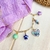 Collar Sirena de cadena dorada con cuentas  de cerámica y un colgante de corazón