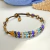 Black anklet