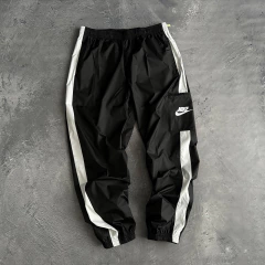 Pantalón Rompevientos Nike NSW