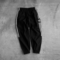 Pantalón adidas rompevientos originals Trefoil - comprar online