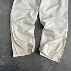 Pantalón rompevientos Nike Court ‘90