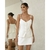 Conjunto Megan Off White (Regata + Shorts saia) na internet