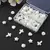 KIT CUENTAS NACARADAS 4 FORMAS CORAZON ESTRELLA CRUZ OSTRA X 35G X 85 UNI - Novara Store