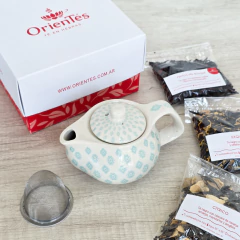 Tetera 250 cc + 3 tés nac. Por 25gr c/u. Modelo rombos celestes