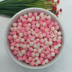 https://www.aviamentosnj.com.br/produtos/perola-craquelada-com-furo-passante-tamanho-10mm-em-abs-com-500-gramas-rosa-com-branco/