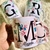 Caneca cerâmica com colher - INICIAL FLORAL na internet