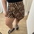 Short pollera animal print