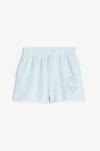 Short "H&M" - Celeste de algodón rústico, con mariposas brillitos