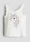 Musculosa H&M - Cruda con unicornio y volados en los breteles