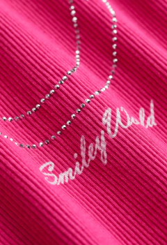 Remera H&M - De morley fucsia "Smile" con brillitos en internet