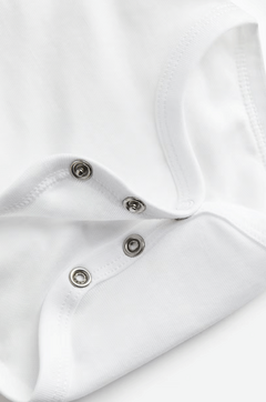 Imagen de Bodies "H&M" - Pack x 3 blancos con animales estampados