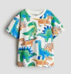 Remera H&M - Cruda con dinosaurios verdes, azules y marones - comprar online