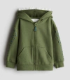 Campera "H&M". Verde con frisa, detalles de dino con capucha !!! - comprar online