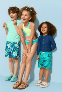 Imagen de Conjunto "Carter´s" - Remera UV manga larga + malla azul francia con dinosaurios