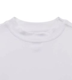 Remera UV "Wonder Nation" - Blanca, manga larga, con detalle elástico a los costados en internet