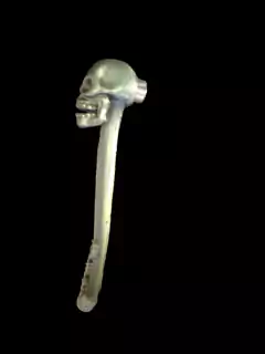 Imã caveira duocolor dourado/preto cilindrico.